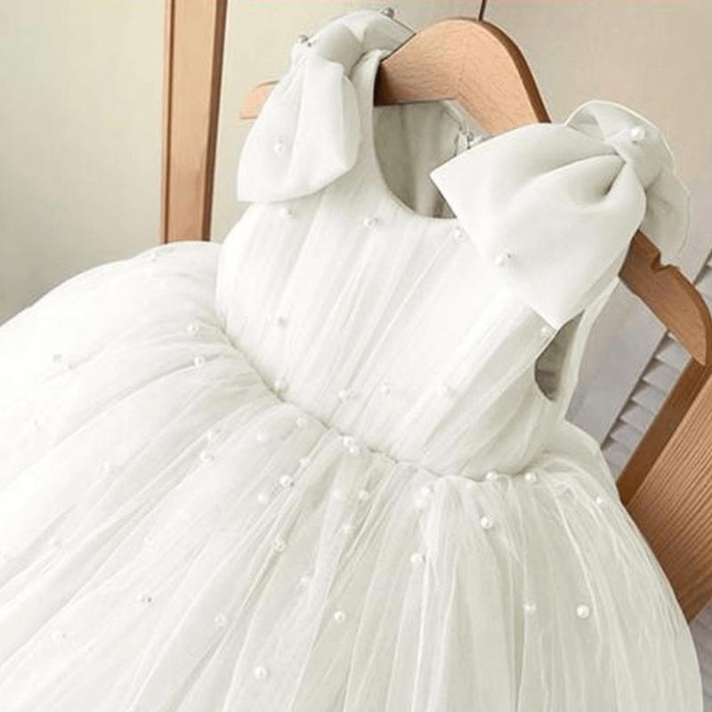 Robe princesse sans manches avec nœud en perles