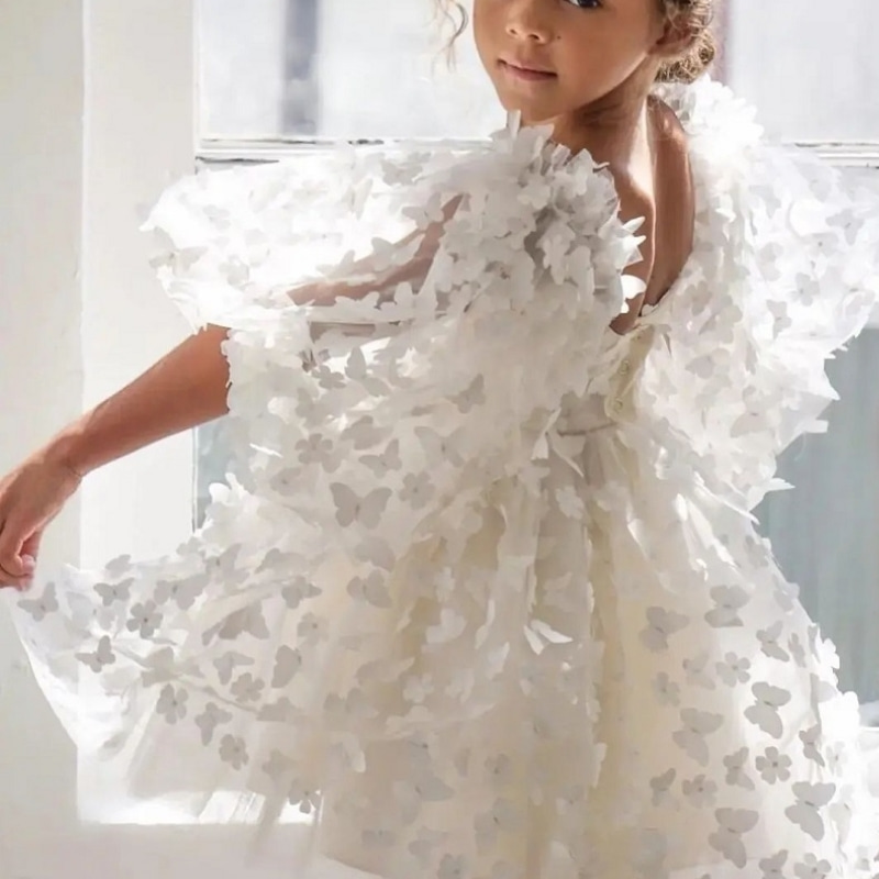 Robe tutu blanche à manches bouffantes et papillon