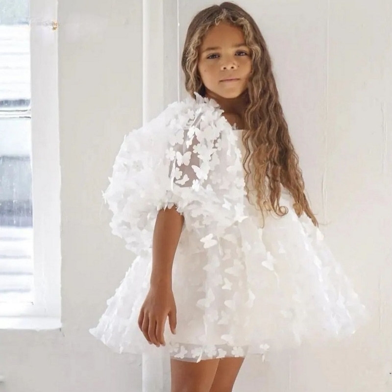 Robe tutu blanche à manches bouffantes et papillon