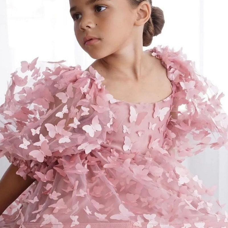 Robe tutu rose à manches bouffantes et papillon